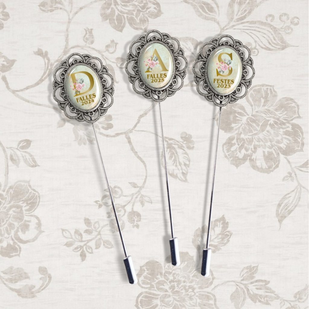 Agujas para la banda con inicial personalizada